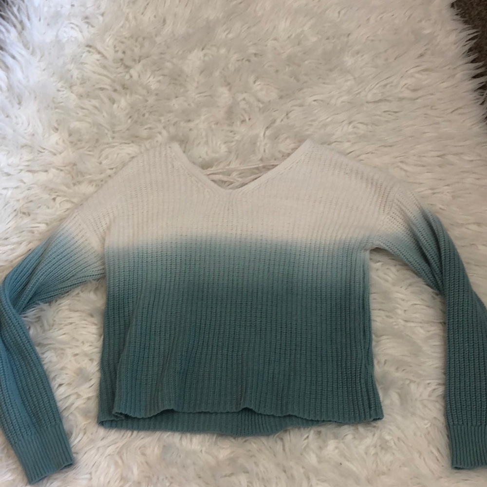 White and blue colored sweater good condition